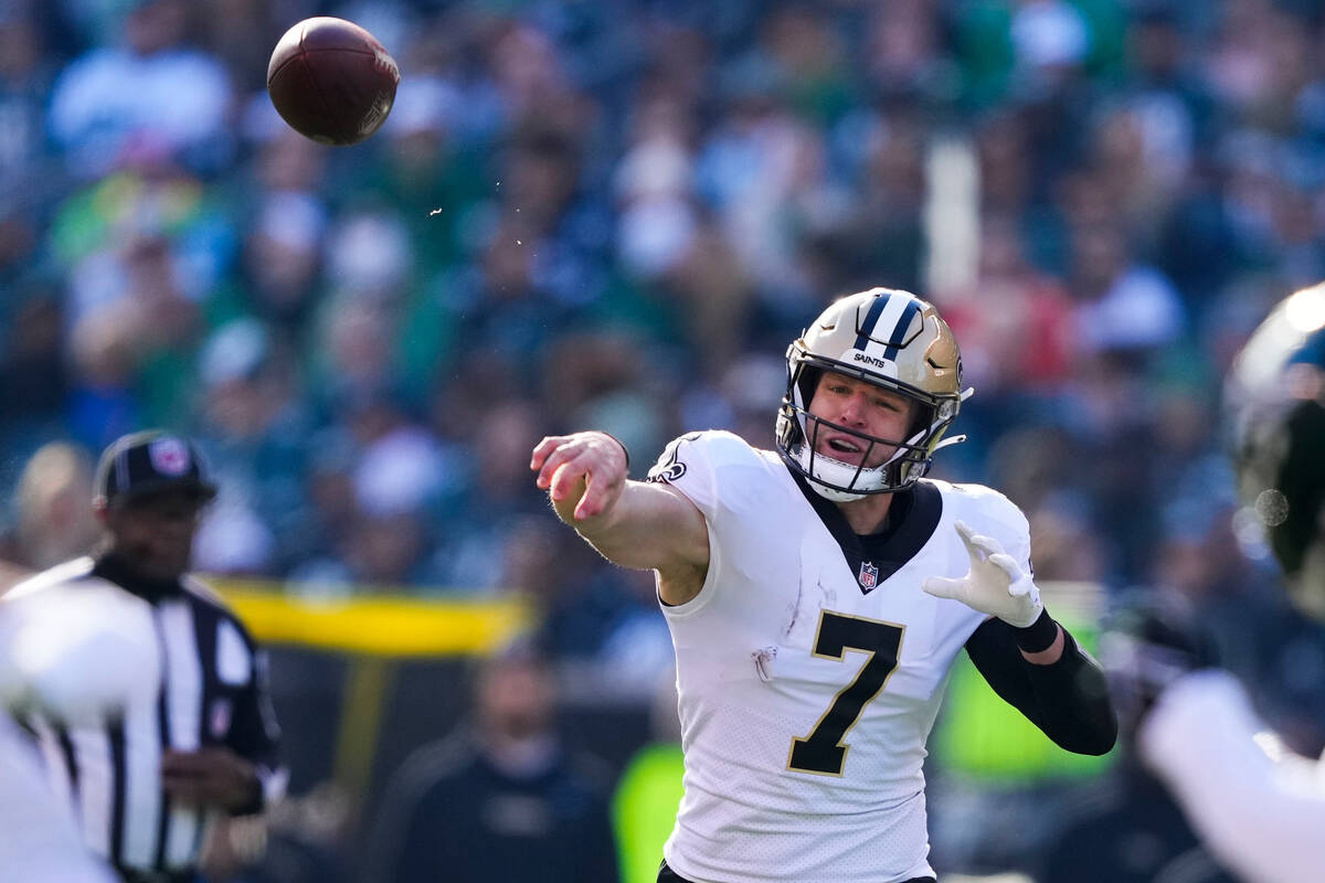 New Orleans Saints Taysom Hill (7) passes in the first half of an NFL football game against the ...
