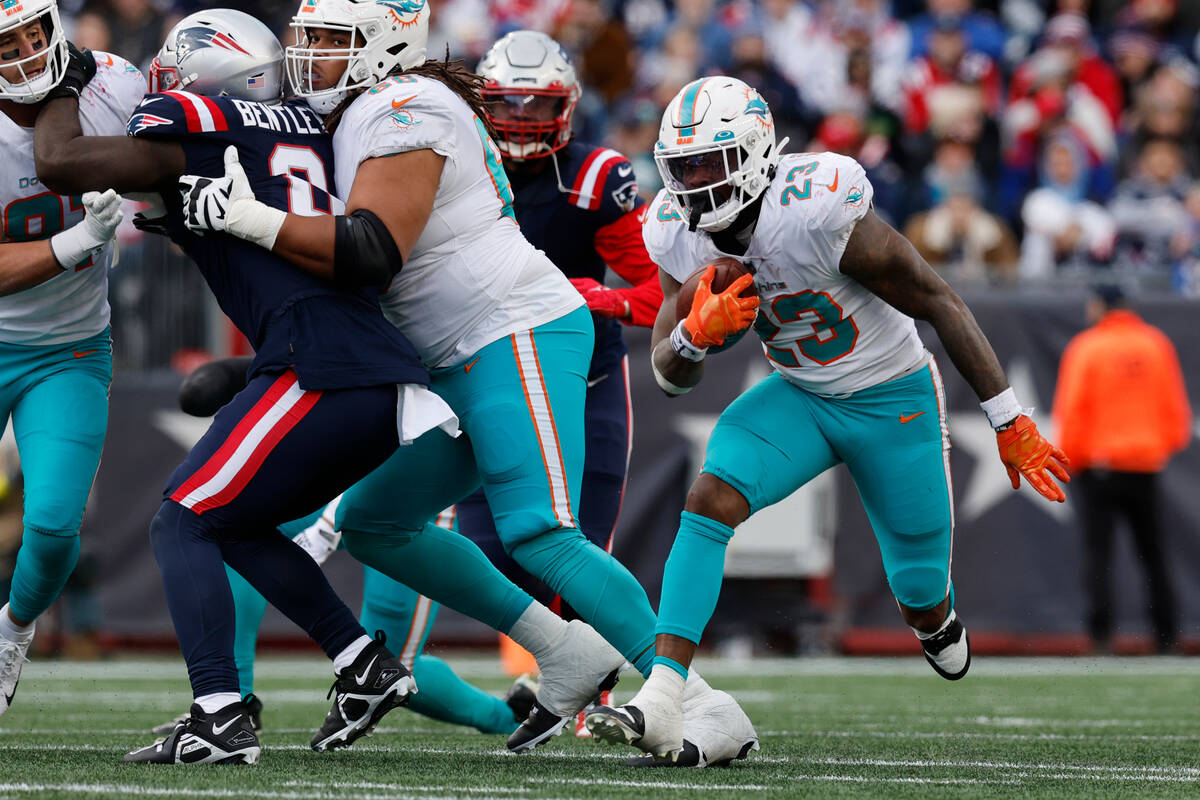 Miami Dolphins running back Jeff Wilson Jr. (23) during the first half of an NFL football game, ...