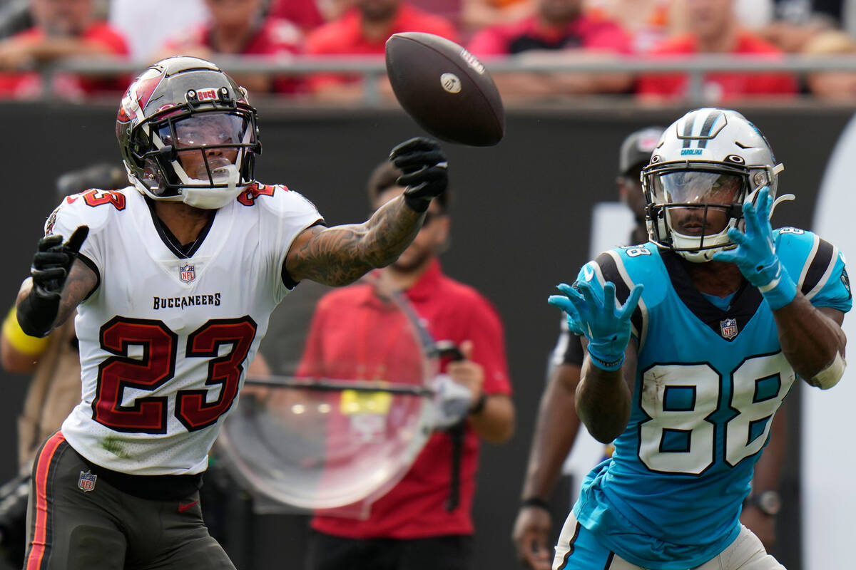 Carolina Panthers wide receiver Terrace Marshall Jr. catches a pass in front of Tampa Bay Bucca ...