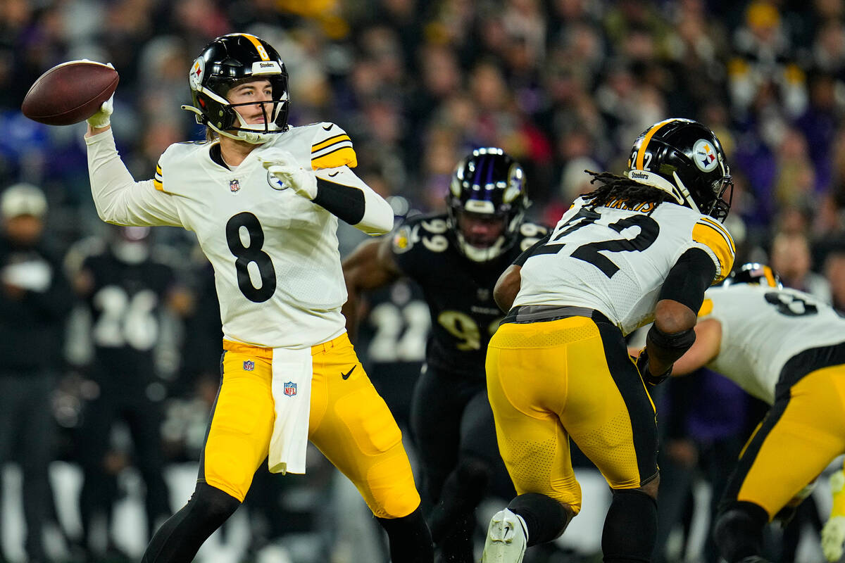Pittsburgh Steelers quarterback Kenny Pickett (8) throws against the Baltimore Ravens in the fi ...