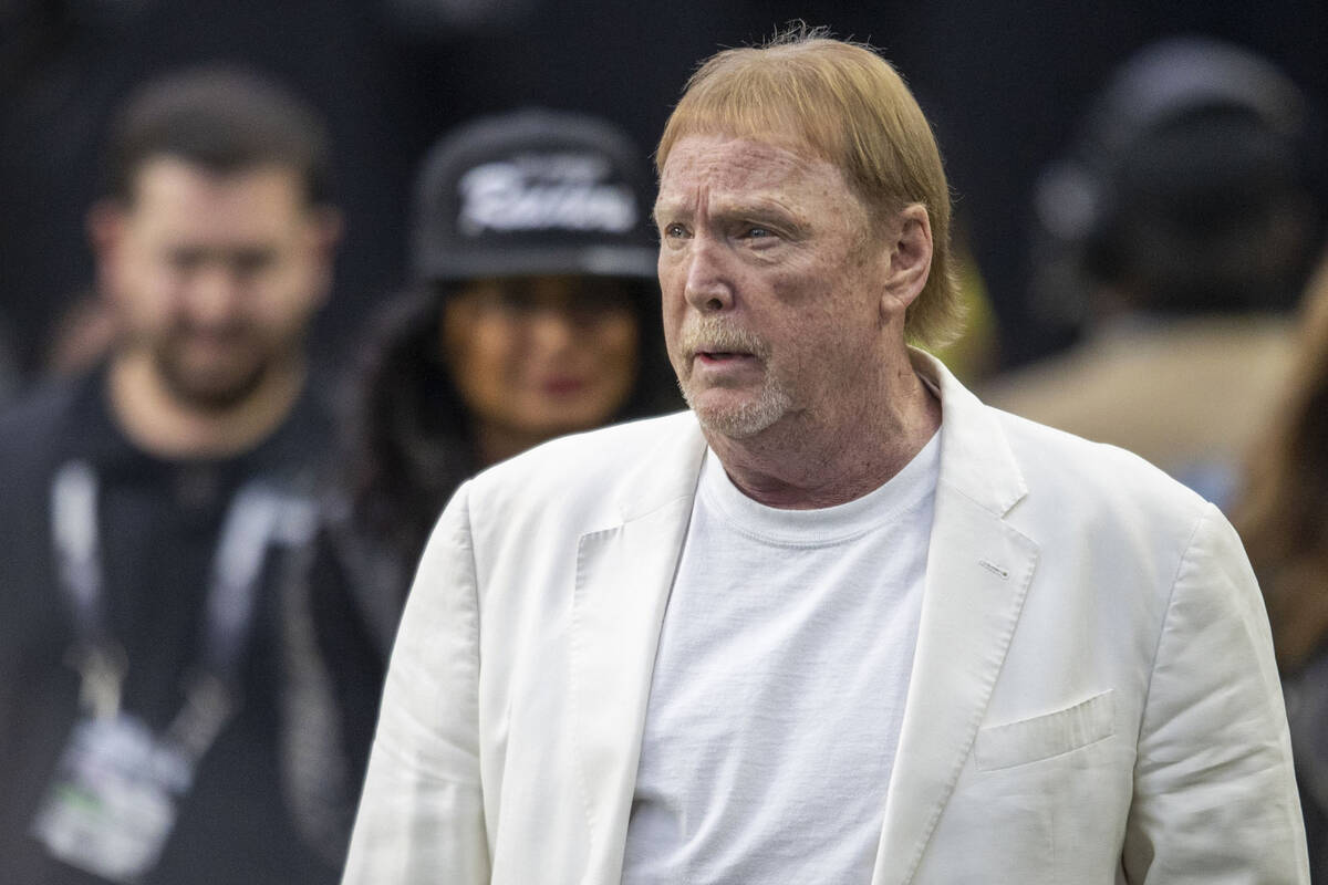 Raiders owner Mark Davis takes the field before an NFL game against the San Francisco 49ers at ...