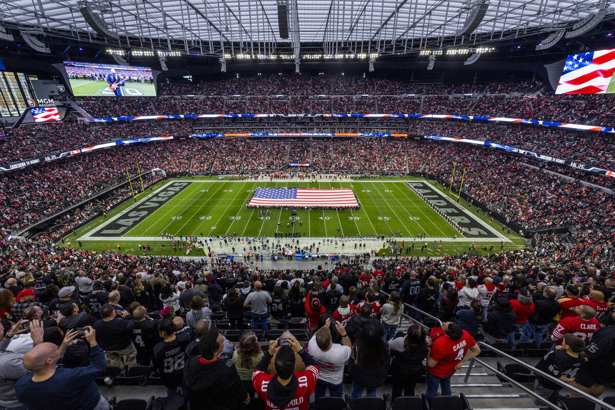 The National Anthem its played by guitarist Joe Satriani before the first half of their NFL ga ...