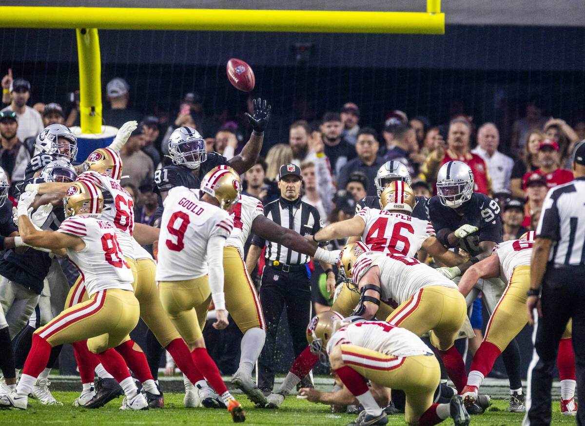 Raiders defensive tackle Bilal Nichols (91) reaches out for a field goal attempt by San Francis ...