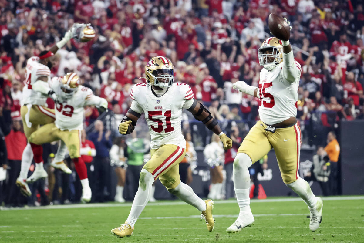 San Francisco 49ers linebacker Azeez Al-Shaair (51) and defensive end Drake Jackson (95) celebr ...
