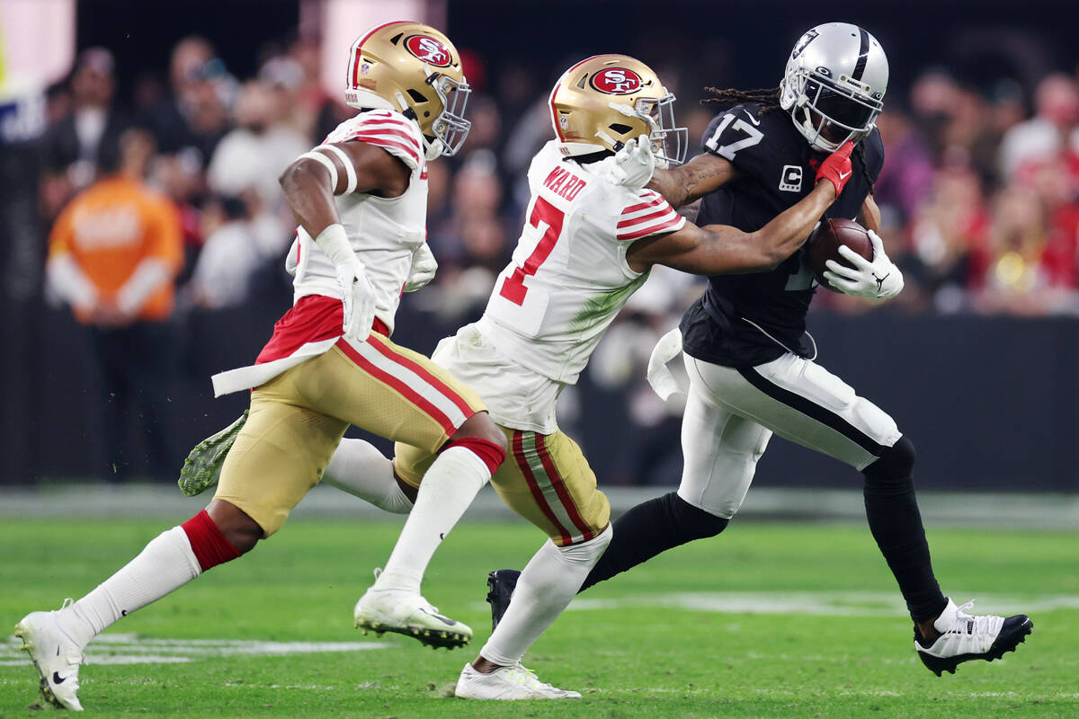 Raiders tight end Foster Moreau (87) is tackled by San Francisco 49ers cornerback Jimmie Ward ( ...