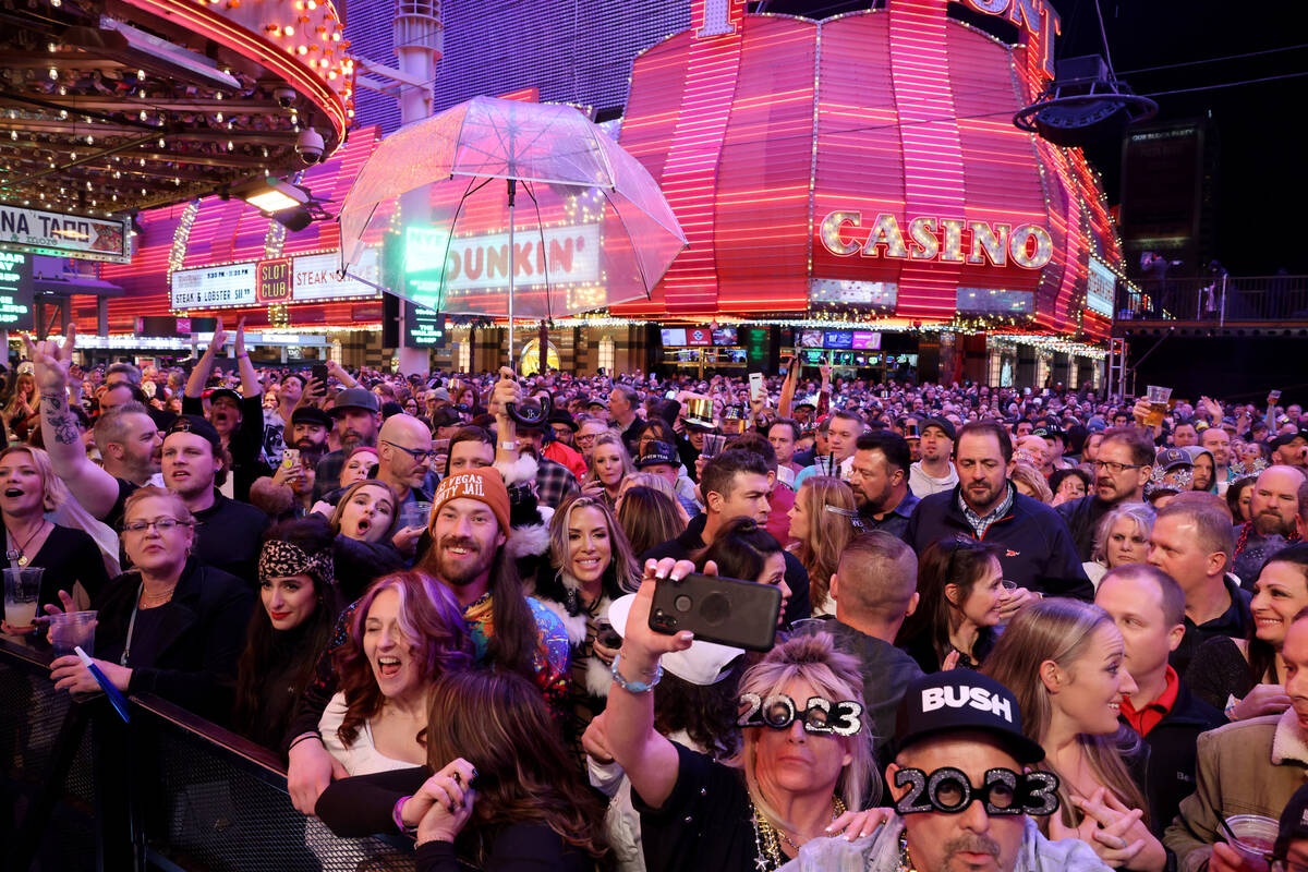 A single protective plastic device emerged from the New Year's Eve throng on Fremont Street as ...