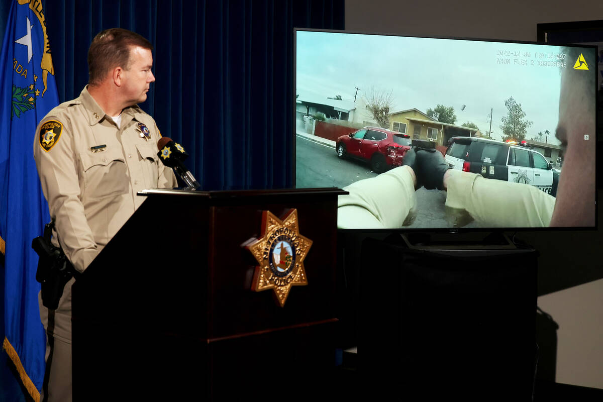 Las Vegas police Assistant Sheriff James Seebock shows body worn camera video during briefing a ...