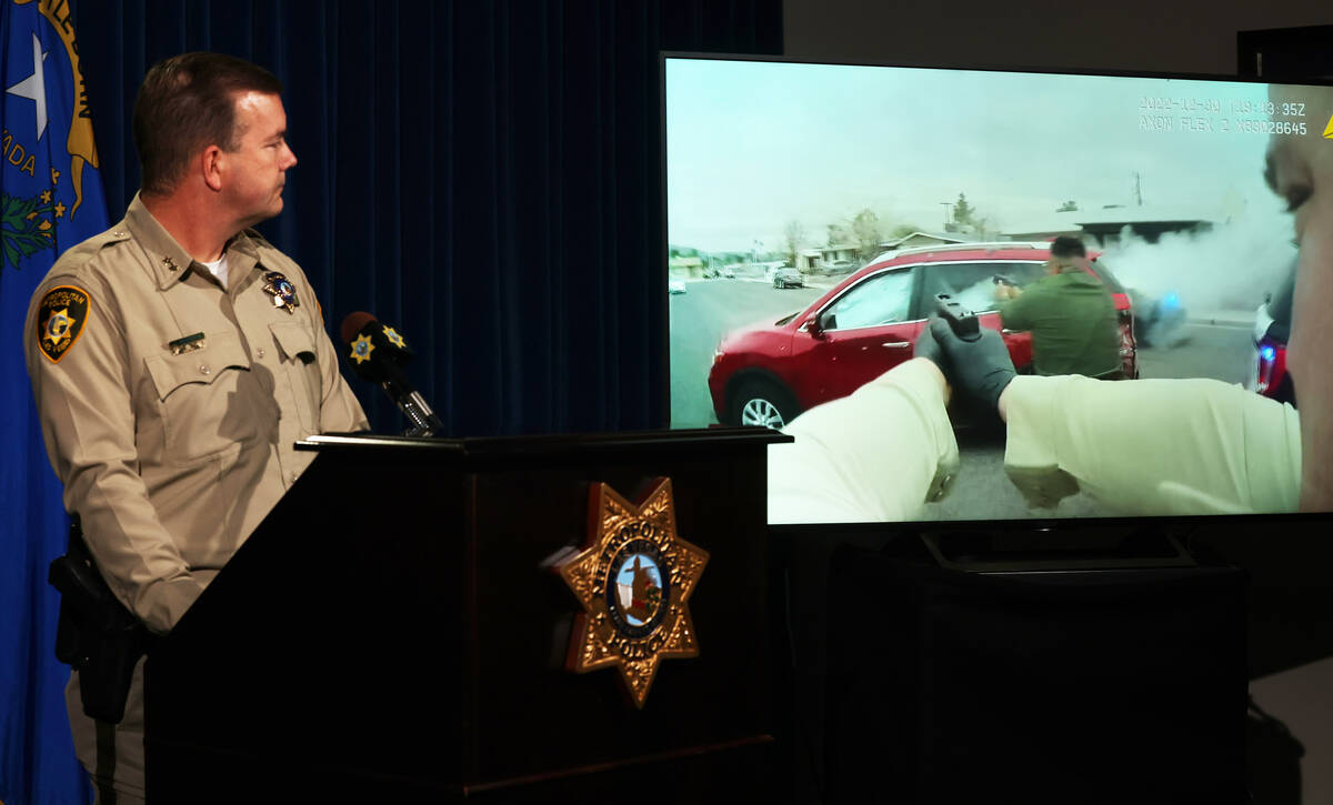 Las Vegas police Assistant Sheriff James Seebock shows body worn camera video during briefing a ...