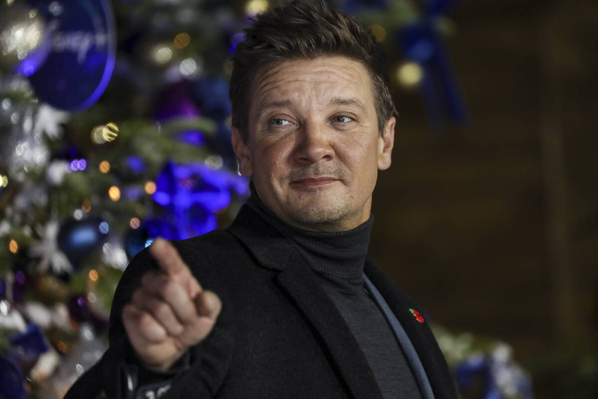 Jeremy Renner poses for photographers upon arrival at the UK Fan Screening of the film "Hawkeye ...