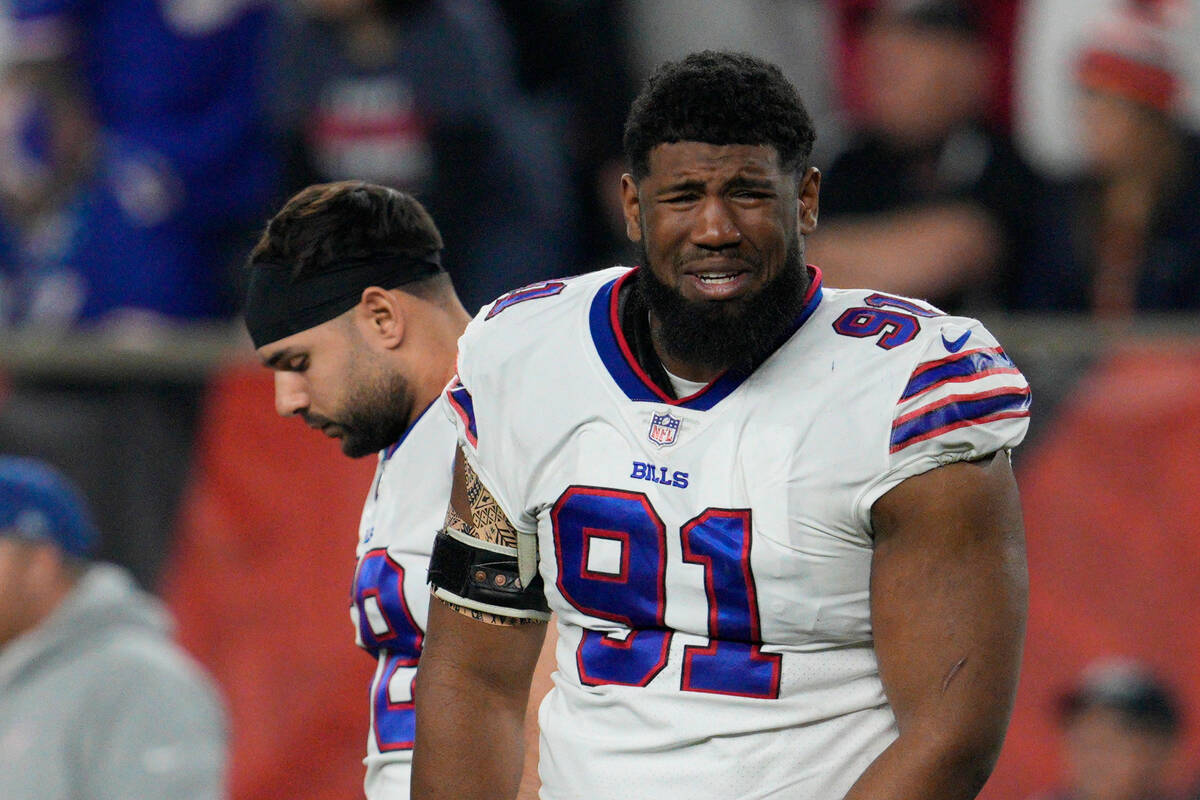 Buffalo Bills' Ed Oliver reacts after teammate Damar Hamlin is being examined during the first ...