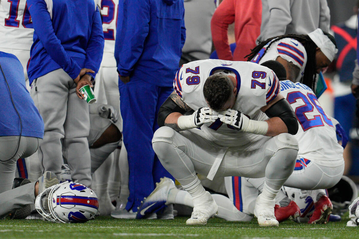 Buffalo Bills' Spencer Brown (79) reacts as teammate Damar Hamlin is examined during the first ...