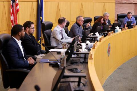 Clark County Commission Chairman Jim Gibson, center, chastises a member of the audience for an ...