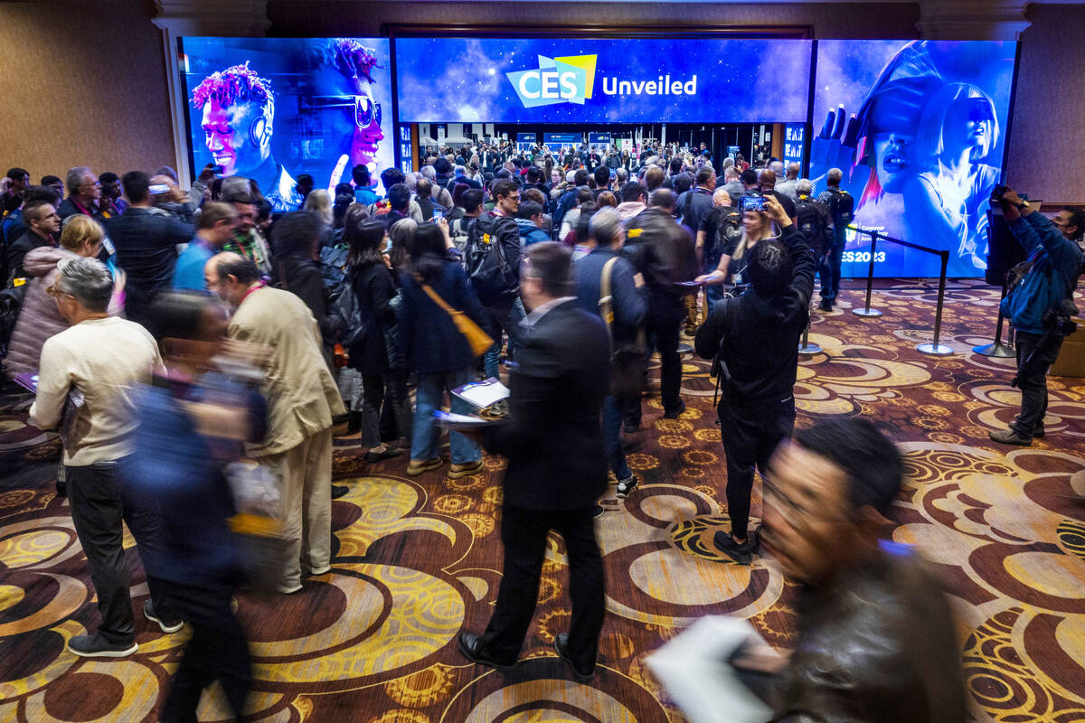 Attendees stream into the CES Unveiled media days event at the Mandalay Bay Convention Center o ...
