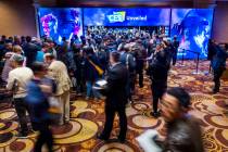 Attendees stream into the CES Unveiled media days event at the Mandalay Bay Convention Center o ...