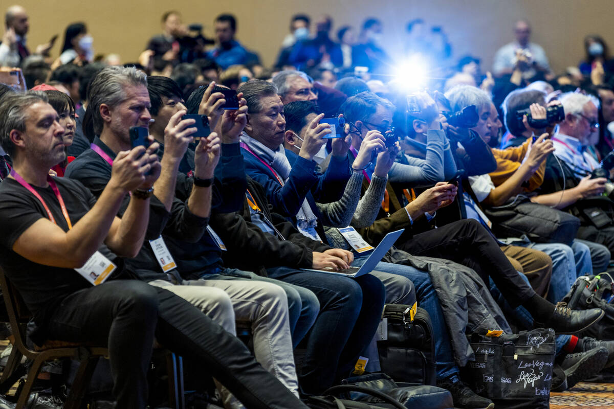 Attendees document the next point addressed as Steve Koenig, vice president of research at the ...