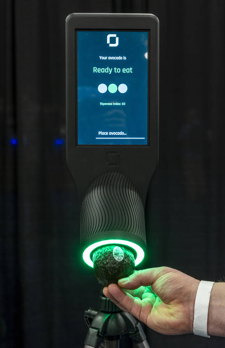 An avocado is checked by a OneThird freshness scanner during the CES Unveiled media days event ...