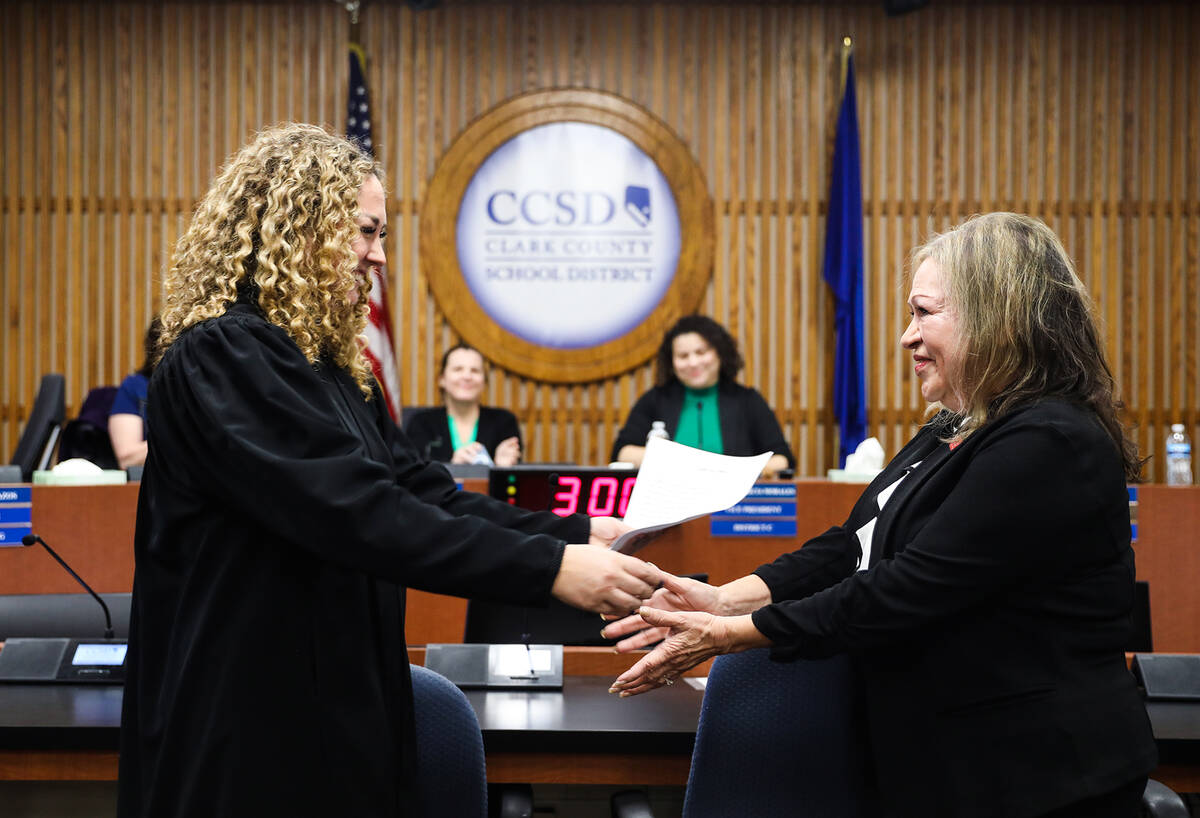 Clark County District Court Judge Carli Kierny goes to hug Linda Cavazos, incumbent for school ...
