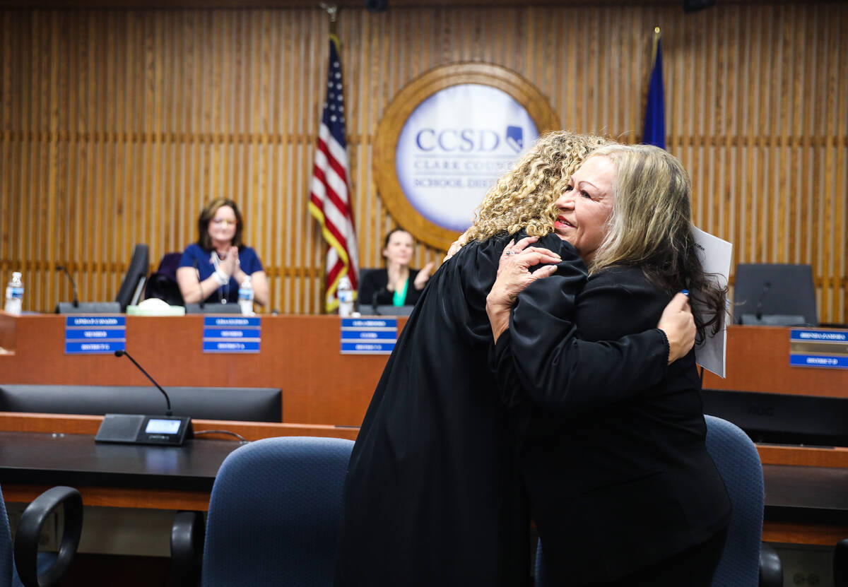 Clark County District Court Judge Carli Kierny hugs Linda Cavazos, incumbent for school board t ...