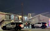 Police investigate killing in apartments behind Strat