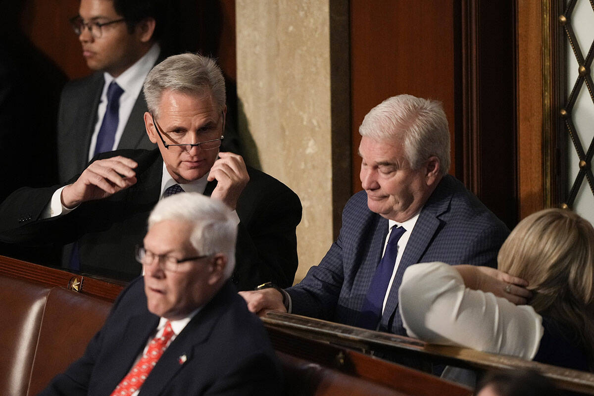 Rep. Kevin McCarthy, R-Calif., stands with Rep. Tom Emmer, R-Minn., during the sixth round of v ...