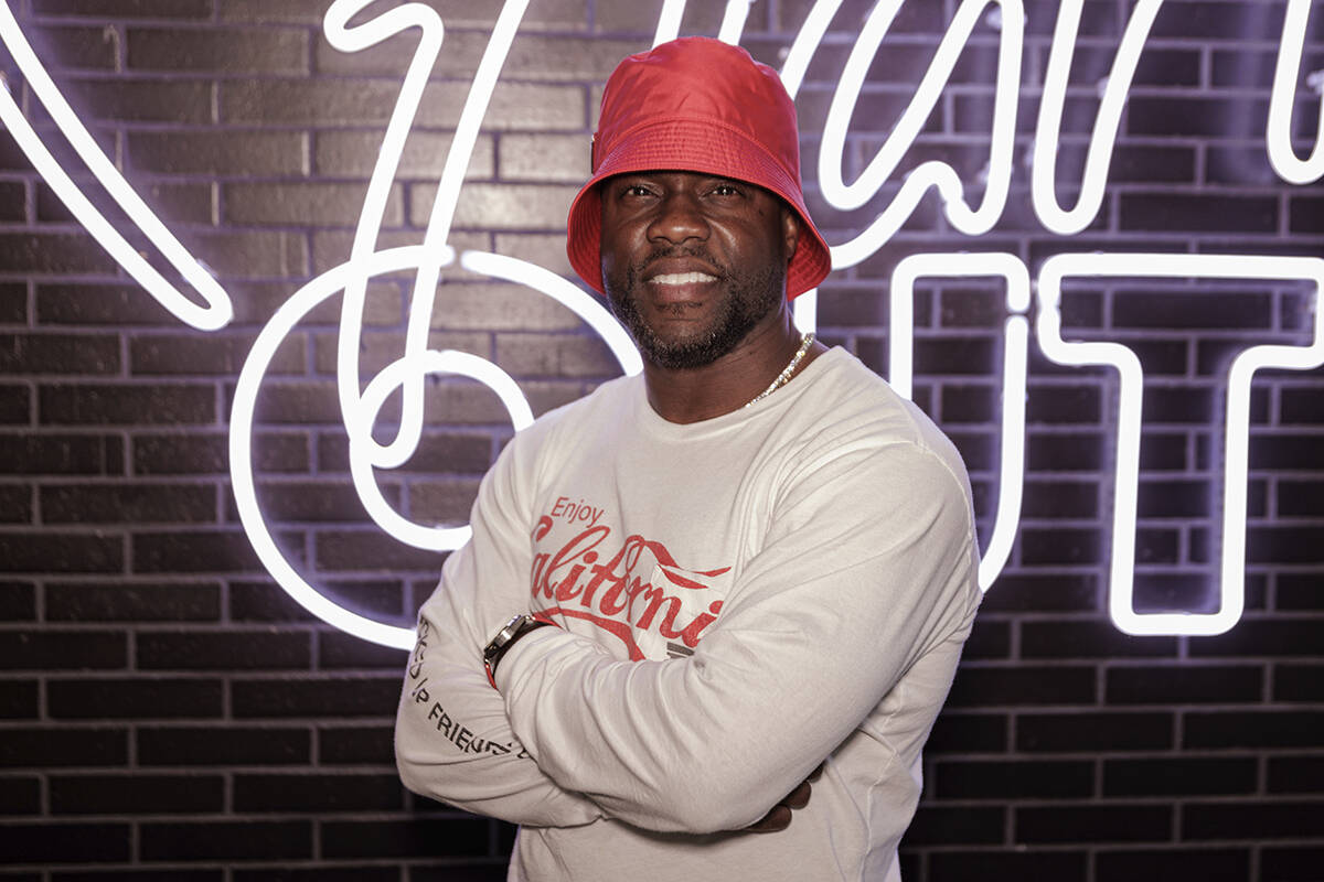 FILE - Kevin Hart poses for a portrait at the opening of his new vegan fast-food restaurant "Ha ...