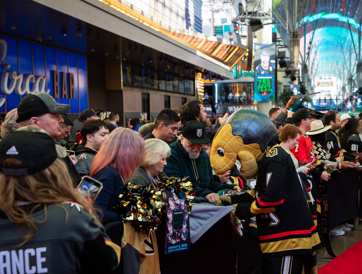 Chance greets fans as he makes his way down the red carpet during a Las Vegas Knights Fan Fest ...