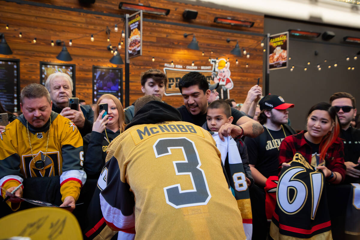 Fans get excited as the Las Vegas Golden Knights’ Brayden McNabb signs autographs during ...