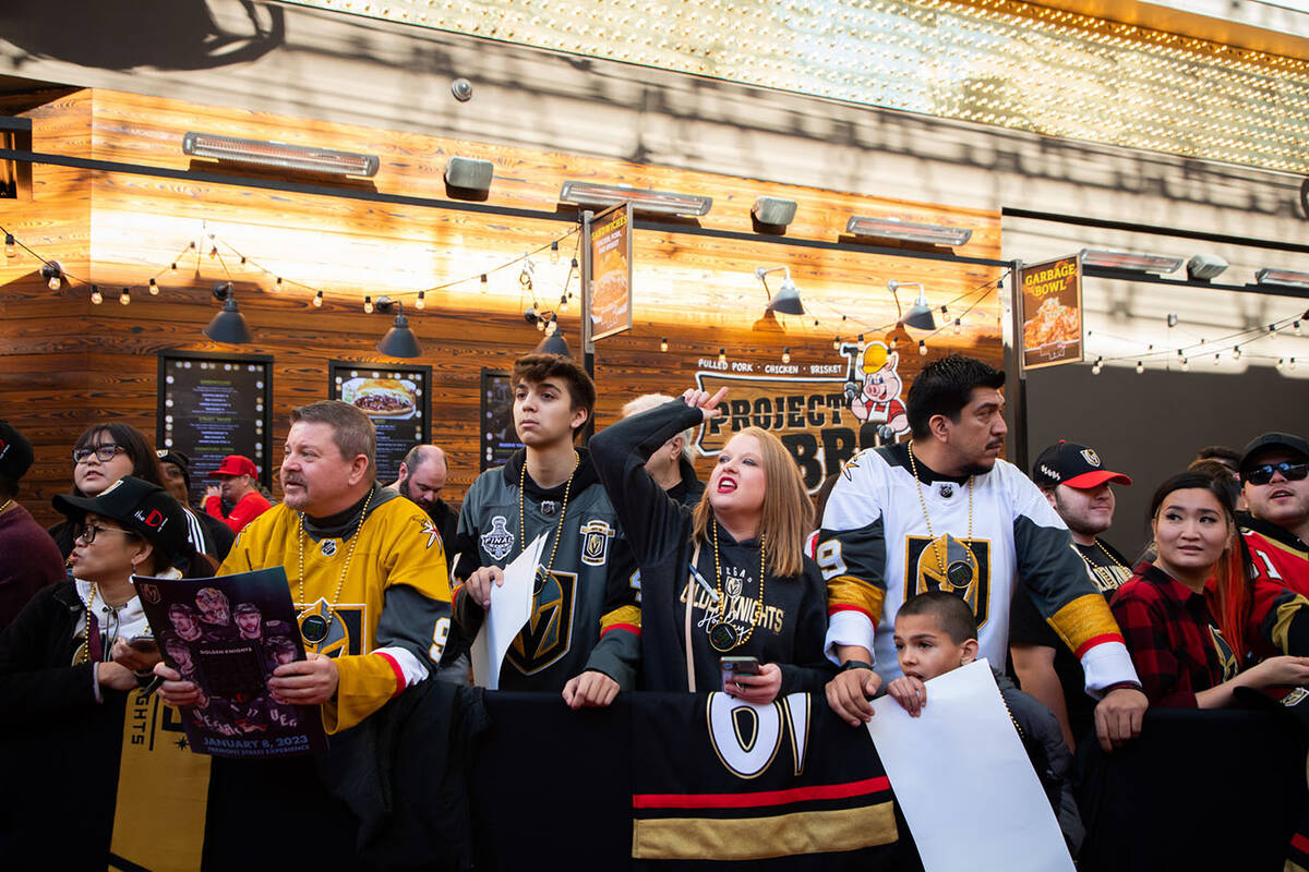 Fans cheer during the Las Vegas Golden Knights Fan Fest at the Fremont Street Experience Main S ...