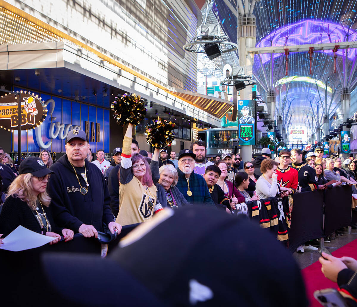 Fans cheer during the Las Vegas Golden Knights Fan Fest at the Fremont Street Experience Main S ...