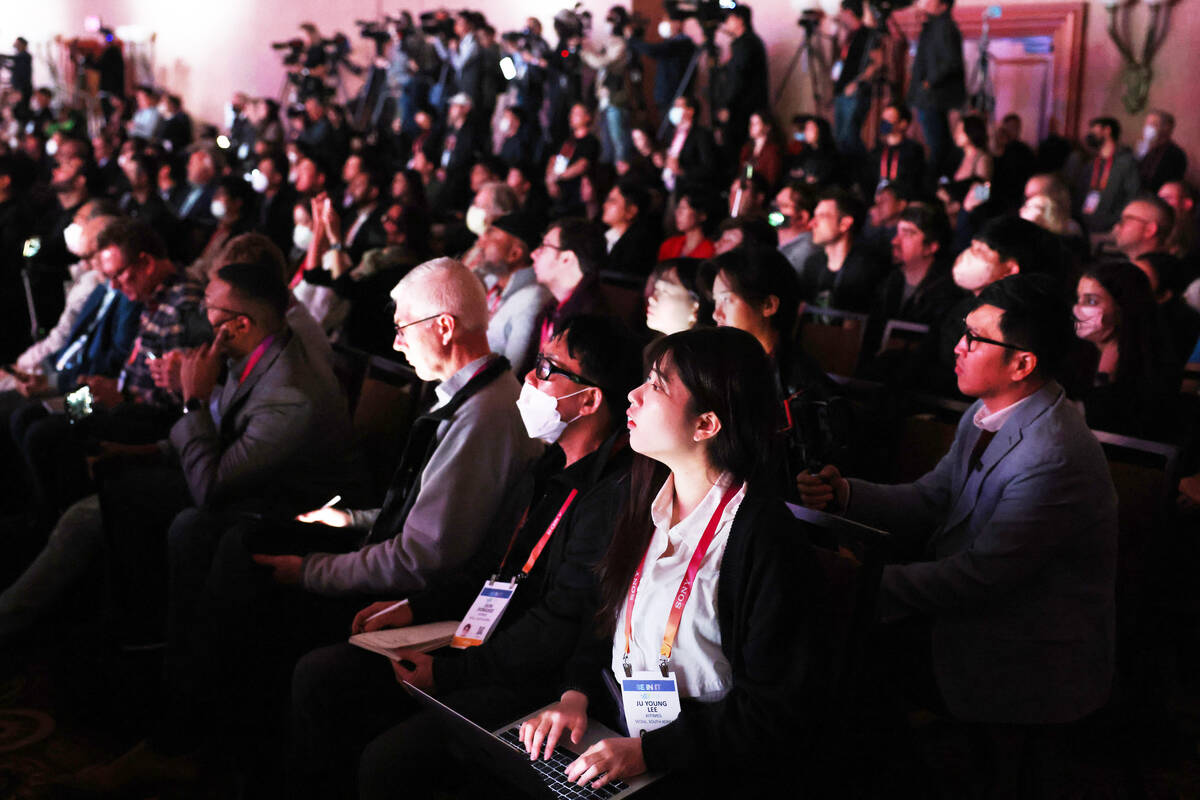 Members of the news media attend the LG Electronics press conference ahead of CES at Mandalay B ...
