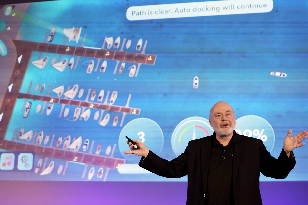 Dave Foulkes, CEO of Brunswick Corporation, show’s the company’s automated boat d ...