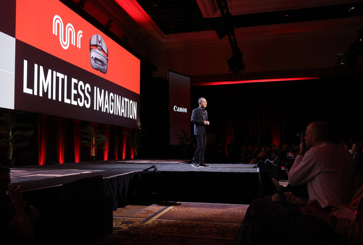 Kazuto “Kevin” Ogawa, president and CEO of Canon Americas, speaks to members of t ...
