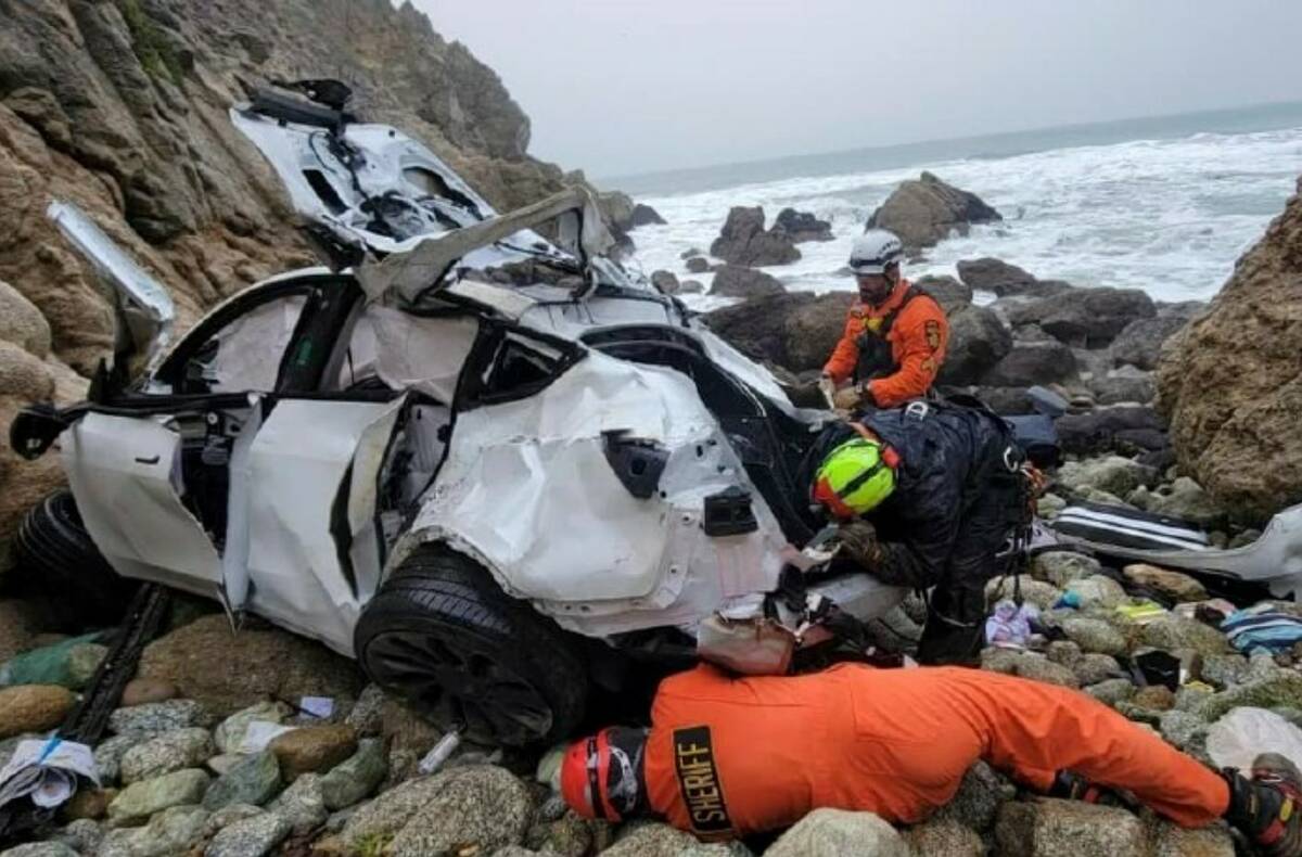 This photo shows emergency personnel responding to a vehicle over the side of Highway 1 on Sund ...