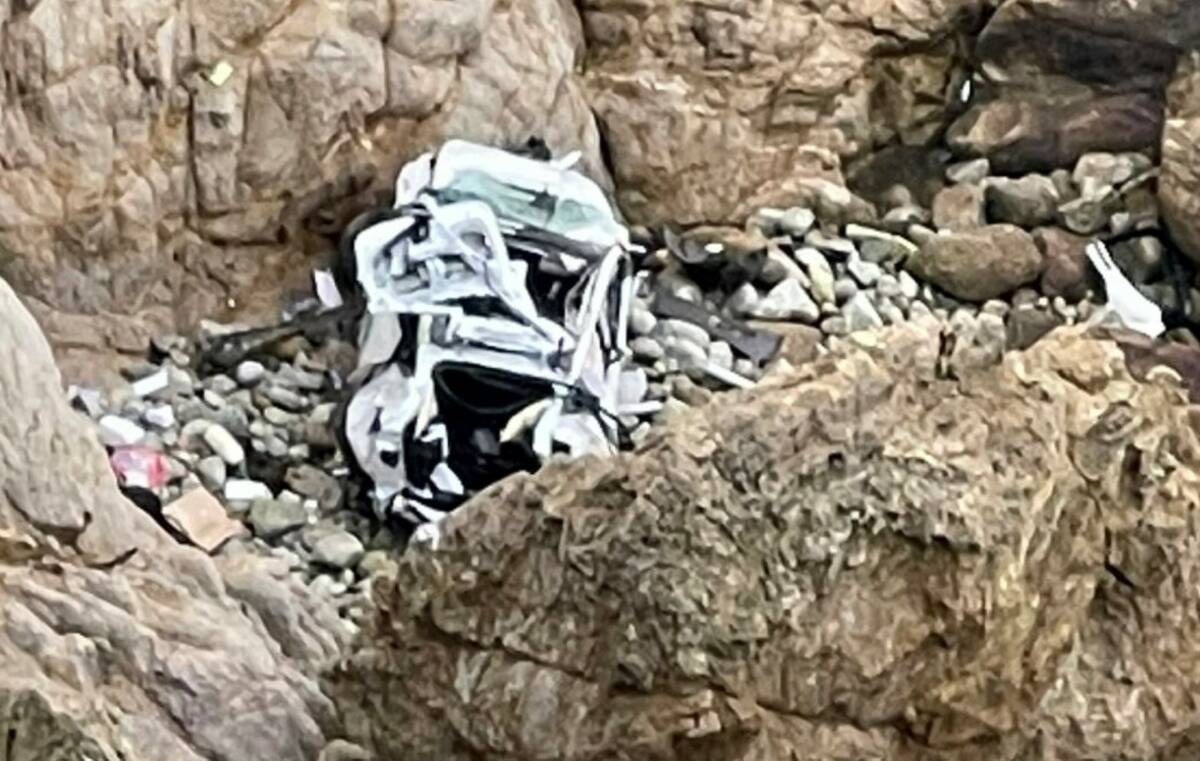 This image from video shows a Tesla vehicle that plunged off a Northern California cliff along ...
