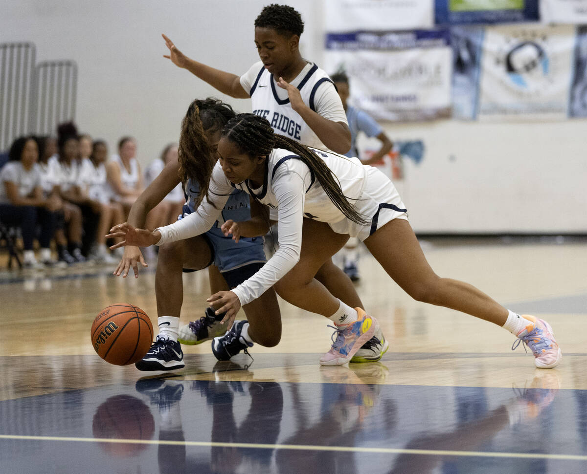 Shadow Ridge’s Hannah Hayes, bottom right, dives for the ball with Centennial’s A ...