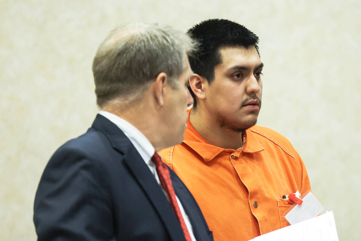 Defense attorney Craig Mueller addresses the court next to his client Fernando Reyes, who alleg ...
