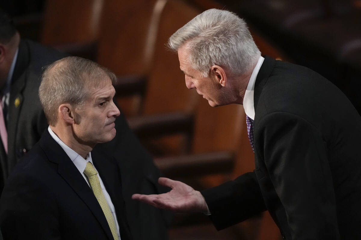 Rep. Jim Jordan, R-Ohio, talks with Rep. Kevin McCarthy, R-Calif., in the House chamber as the ...