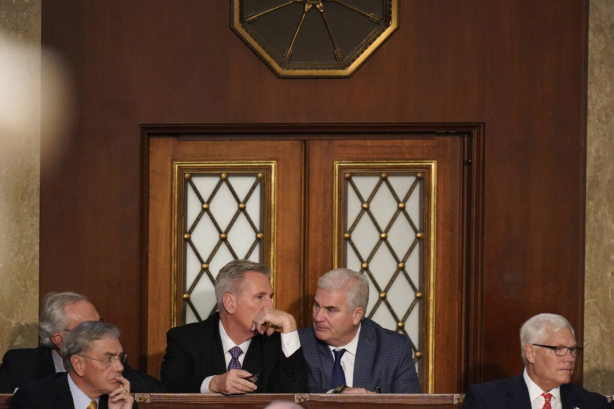 Rep. Kevin McCarthy, R-Calif., talks to Rep. Tom Emmer, R-Minn., during a sixth round of voting ...