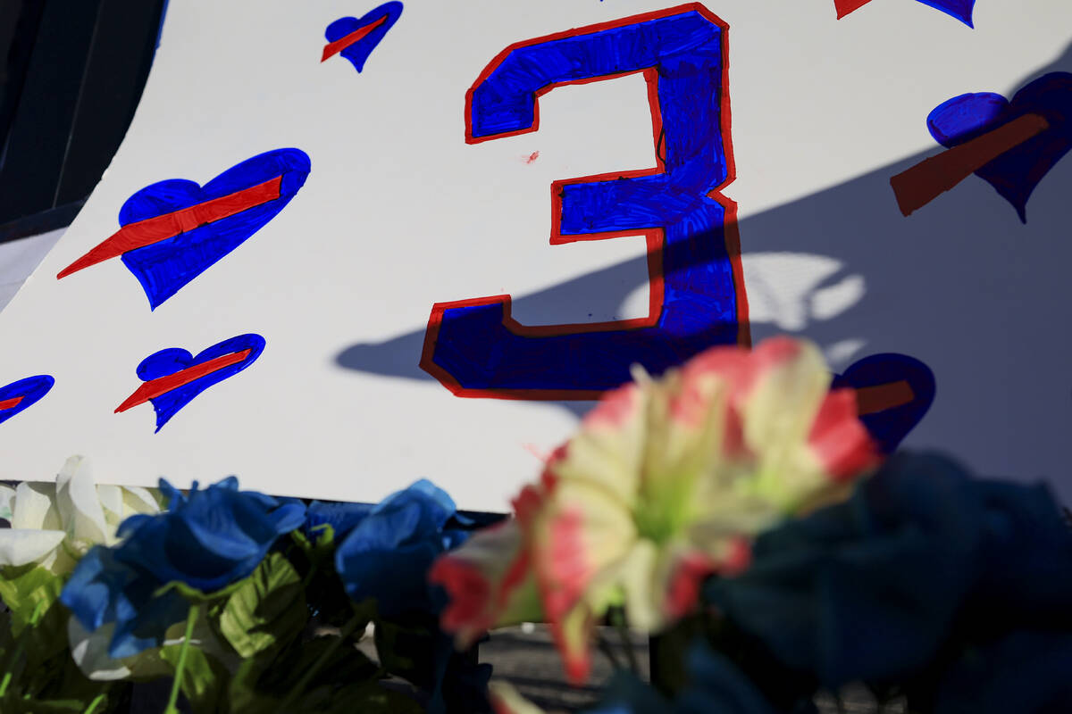 A sign with the number of Buffalo Bills' Damar Hamlin is seen for the display set-up outside of ...