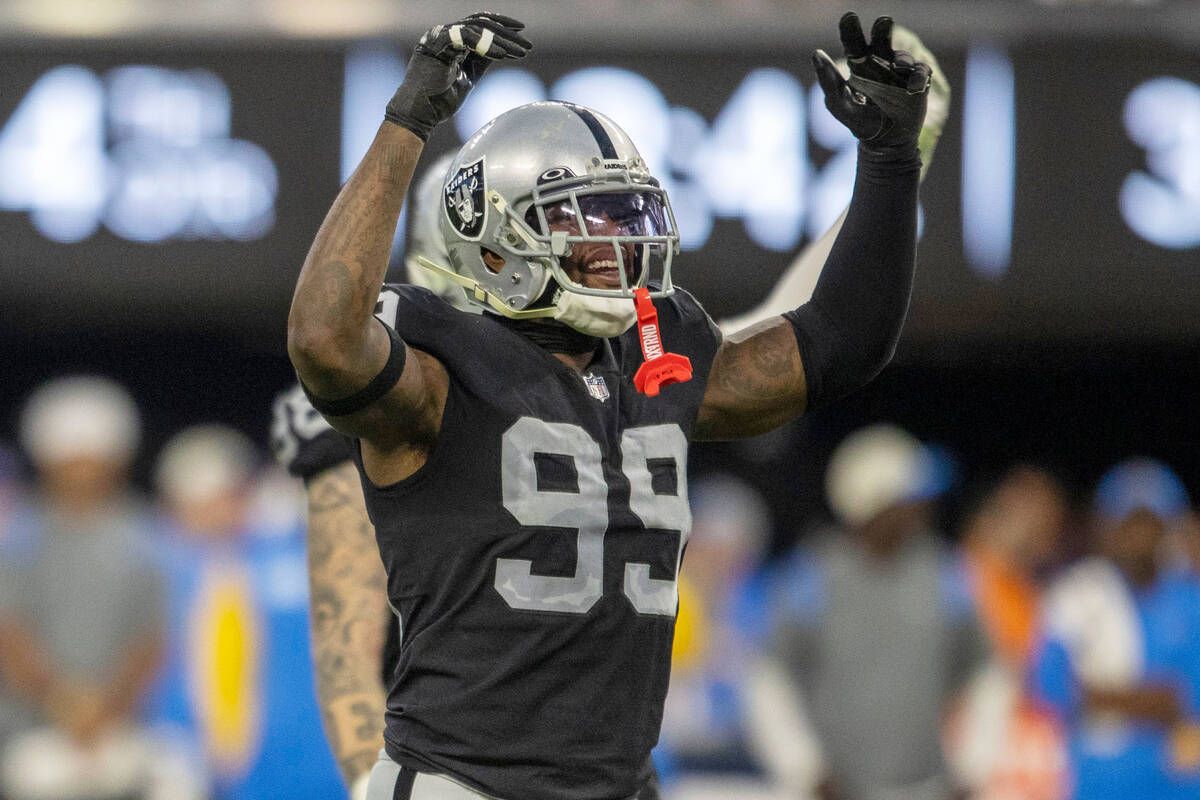 Raiders defensive end Clelin Ferrell (99) celebrates a big defensive play against the Los Angel ...