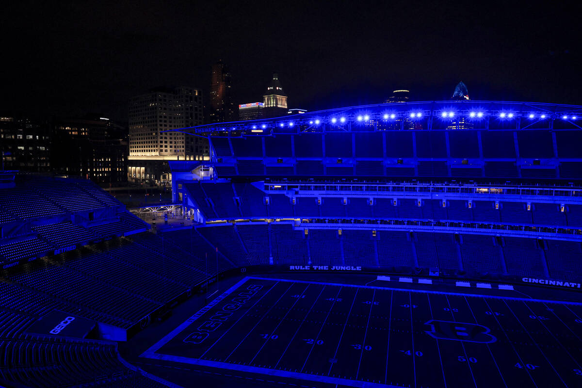 Paycor Stadium lights are illuminated blue in support of Buffalo Bills safety Damar Hamlin, Wed ...