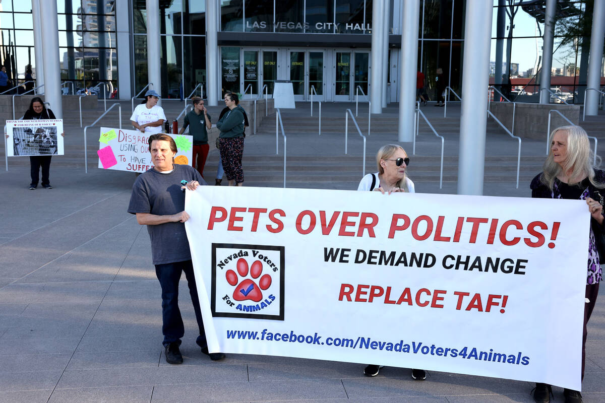 Protesters of The Animal Foundation shelter, including former employees from left, Steve Collie ...