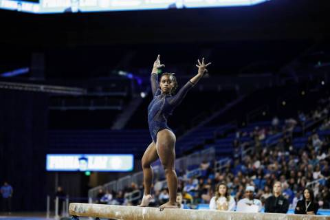 UCLA freshman gymnast Selena Harris performs on the balance beam at the school's annual "Meet t ...