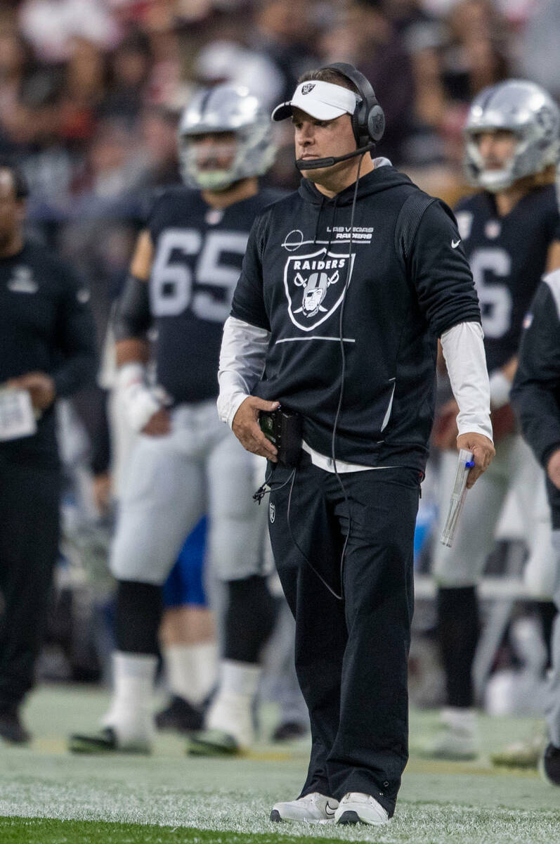 Raiders head coach Josh McDaniels watches from the sideline during the first half of an NFL gam ...