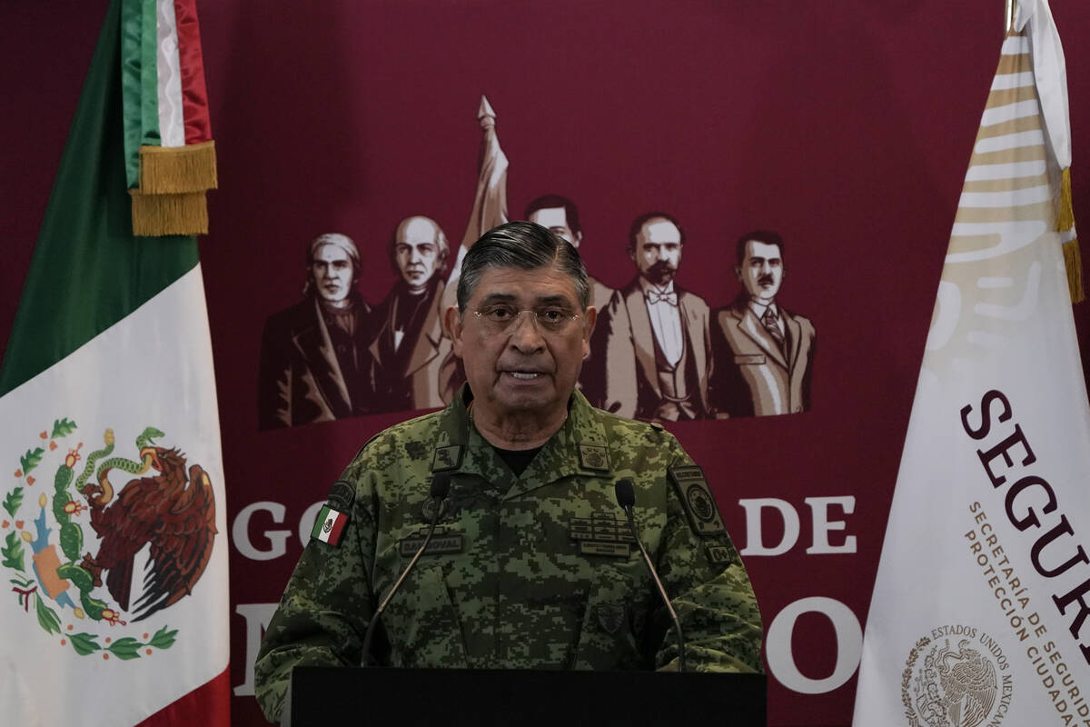 Mexican Defense Secretary Luis Cresencio Sandoval announces the arrest of Ovidio during a press ...