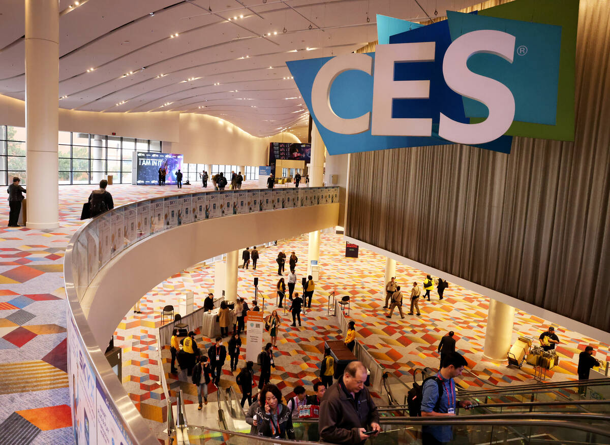 Conventioneers arrive for the opening day of CES at Venetian Expo in Las Vegas Thursday, Jan. 4 ...