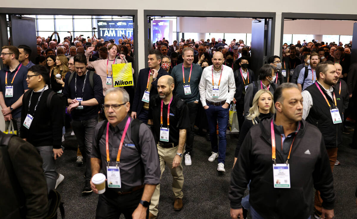 Conventioneers file onto the show floor for CES at Venetian Expo in Las Vegas Thursday, Jan. 4, ...