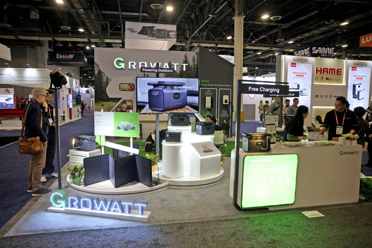 Conventioneers check out Growatt solar generators and power stations on opening day of CES at V ...