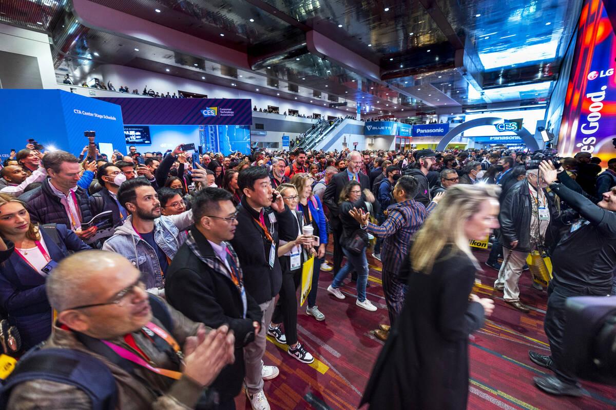 Attendees enter central hall during the opening day of CES 2023 at the Las Vegas Convention Cen ...