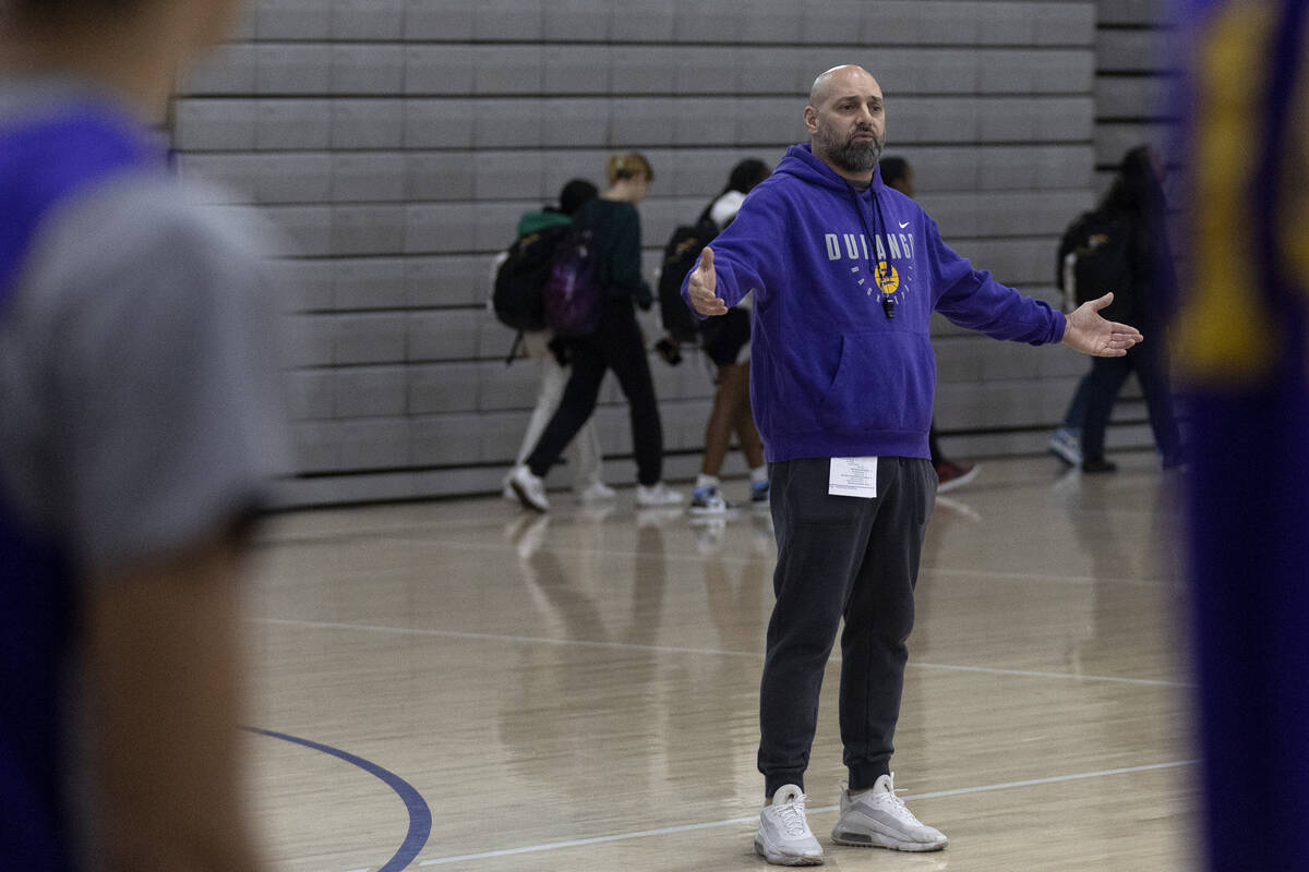 Durango head coach Chad Beeten works with his team during a boys high school basketball practic ...